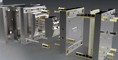 Open injection mold assembly showing cores, plates and guide components